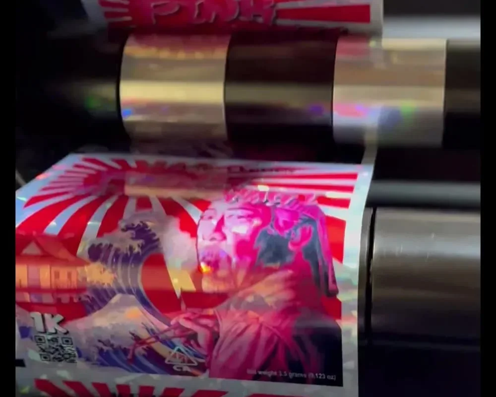 Printed labels winding onto a roll on the rewinder